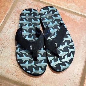 Boys Teva sandals.